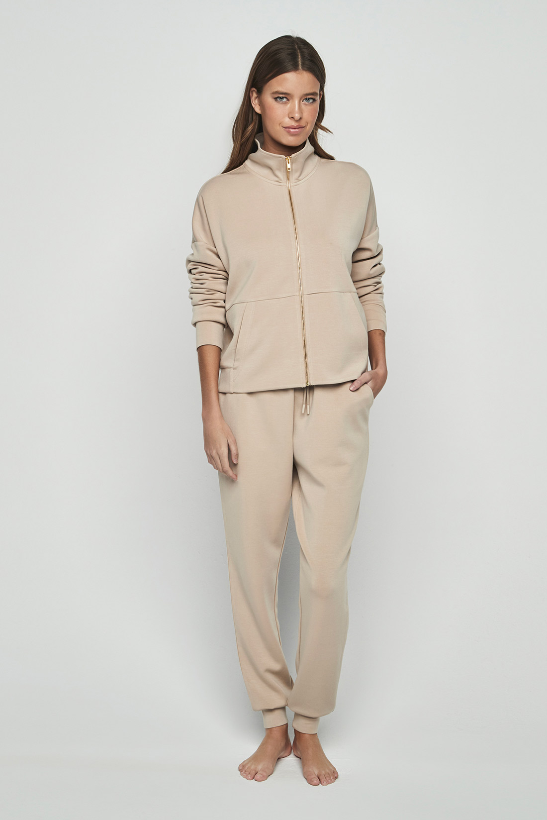 Tuta da donna con zip beige Selmark - immagine 2
